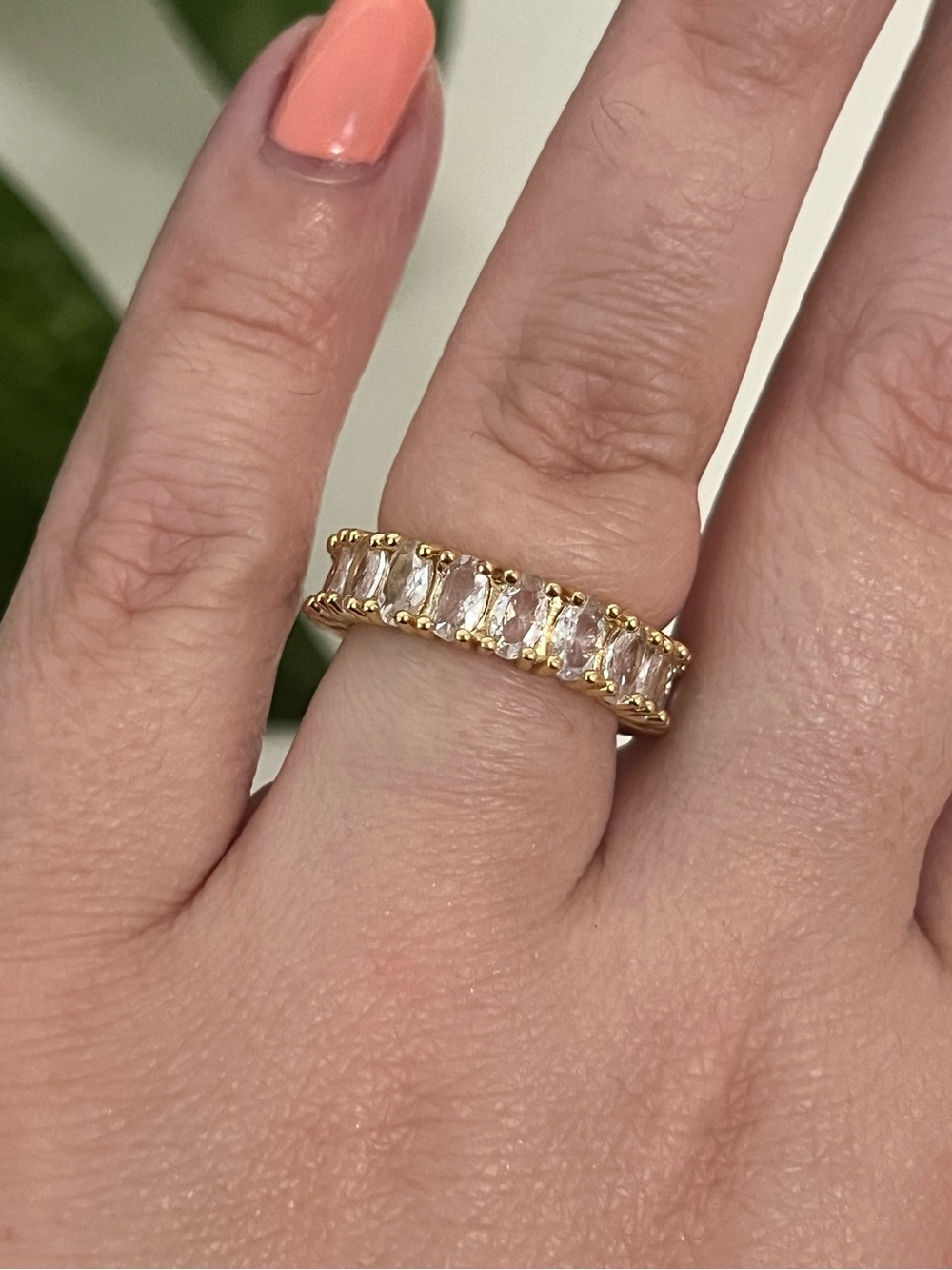 Gold Tone Band Costume Ring with Clear Oval Crystals